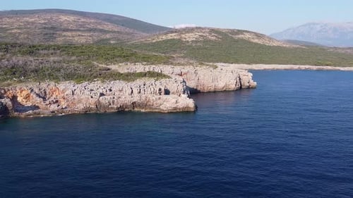 Sloping Rocky Shore By the Sea