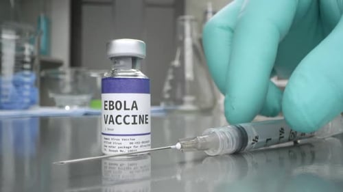 Ebola Vaccine and Syringe in Medical Lab