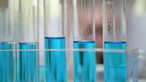 Bright Blue Liquid in Test Tubes in Rack