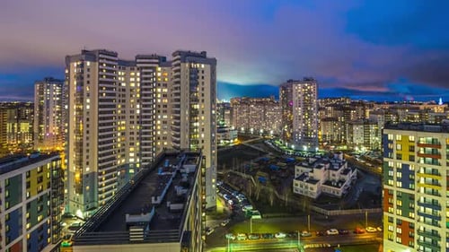 residential buildings at night. timelapse of the night city. living quarters, apartments