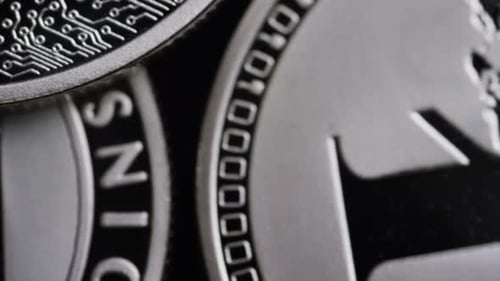 Rotating shot of Bitcoins (digital cryptocurrency) - BITCOIN LITECOIN 541
