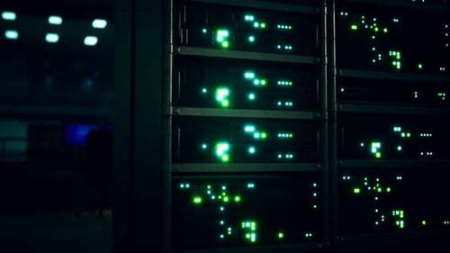 Server Rack Lights Blinking in Dark Data Center