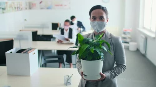 Office Worker With Plant