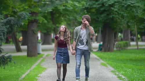 Couple walking on an alley