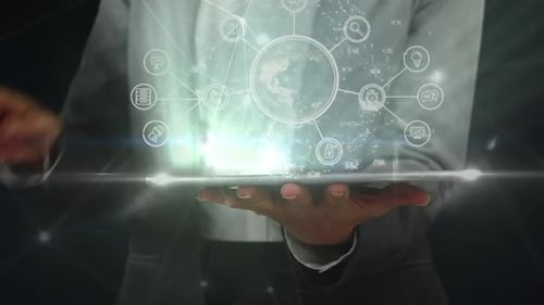 Businessman holding a digital globe in his hand