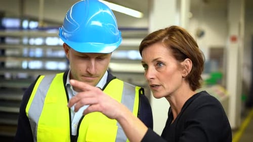 Managers discussing production in company