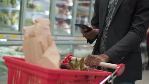 Unrecognizable Man Doing Food Shopping