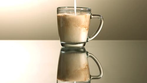 Milk poured into coffee in ultra slow motion 1500fps - COFFEE w MILK PHANTOM