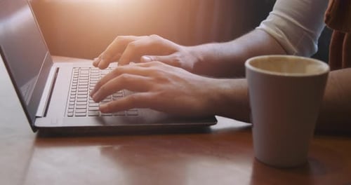 Close Up of Typing Laptop