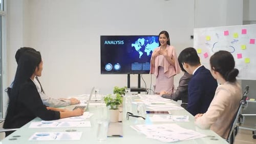 Business Presentation in Modern Office Conference Room