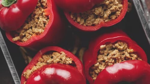 Sweet Red Peppers Stuffed with Meat and Tomato in a Vintage Frying Tray