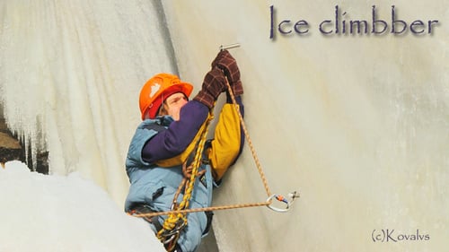 Ice Climber Securing Ropes on Frozen Waterfall