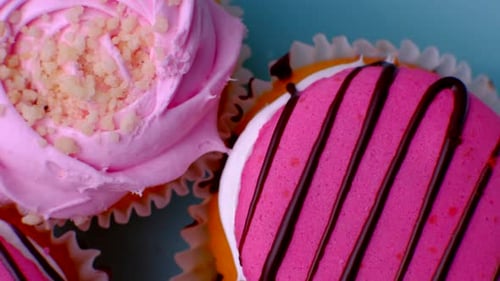 Close Up Delicious Cakes Rotating on Showcase in Shop