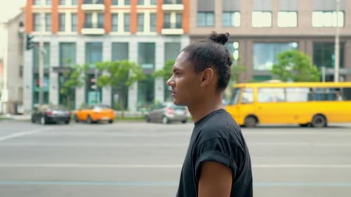 Side View Young Hipster Man Walking on the Street