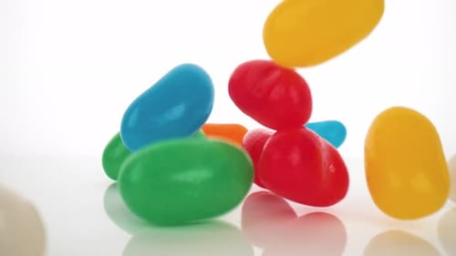 Colorful Jelly Beans Falling in Slow Motion