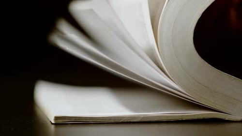 Pages turning in a book, close up shot