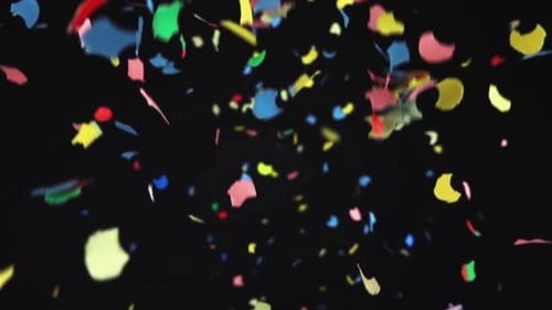 Colorful Confetti Falling Down on Black Background
