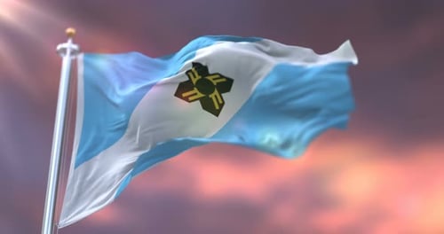 Waving Flag Animation with Emblem Against Sunset Sky