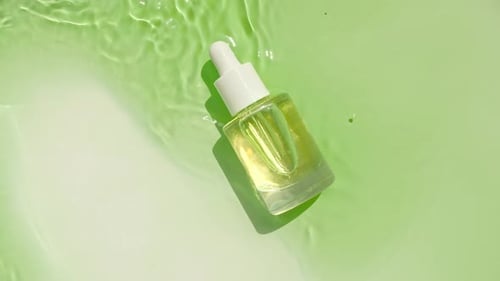 Cosmetic Serum Bottle in Light Green Water