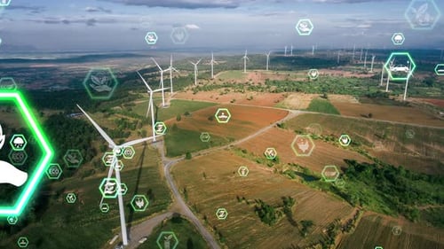 Aerial View of Wind Turbines with Green Energy Graphics