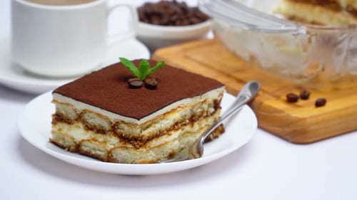 Rich Tiramisu Dessert on Plate with Coffee