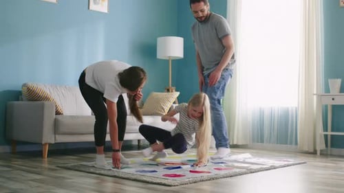 Family Fun Playing a Game Together at Home