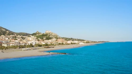 Scenic Aerial View of Coastal Town and Beach