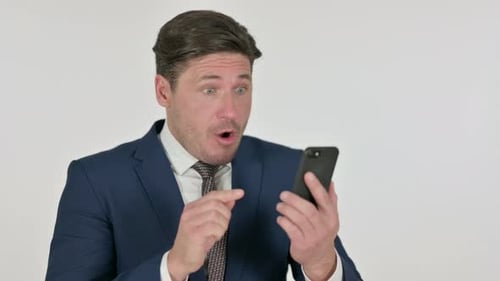 Man in Suit Reacts to Smartphone News