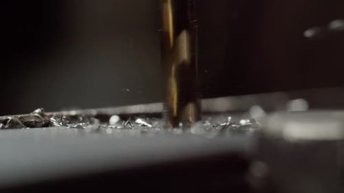 Making Hole in Metal Piece with Spiral Drill in Shop Macro