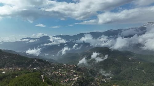 Cloudy landscape high in the mountains aerial view 4 K