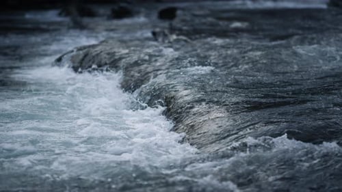 Flowing River Water in Mountain