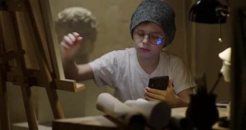 Young Boy Drawing with Phone Inspiration