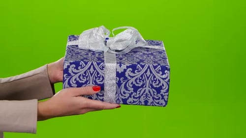 Gift Being Held with Chroma Key Background
