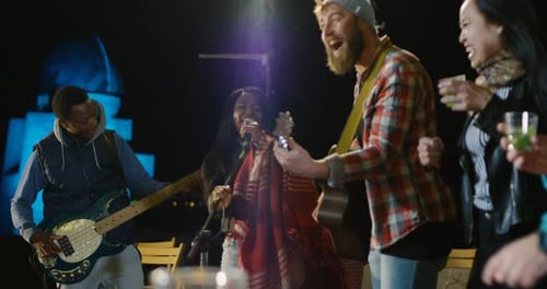 Rooftop Concert Performance at Night