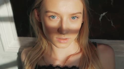 Young Blonde Woman Portrait with Warm Lighting