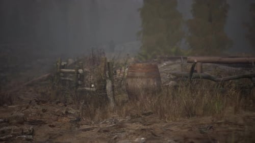 An Old Wood Fence with a Country Field Behind It
