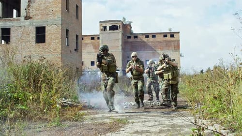 Soldiers Advancing Through Ruined Urban Battlefield