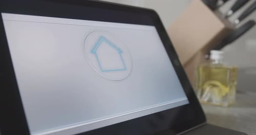 Tapping Digital Tablet With Smart Home App