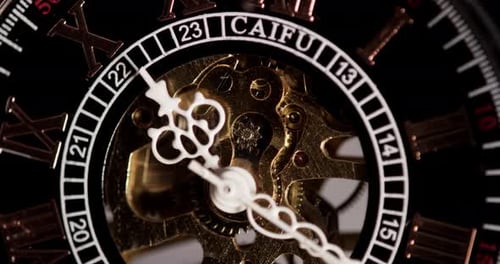 Macro View of Clock Gears and Rotating Hands