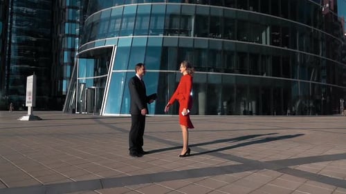 Business Handshake Outside Modern Office Building