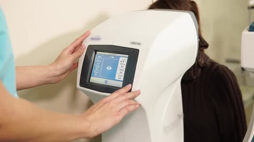 Eye Exam with Modern Medical Equipment in Hospital