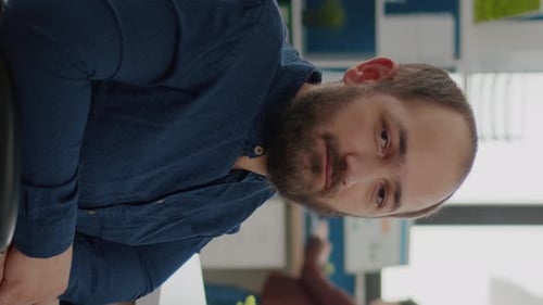 Video Vertical Handicapped Office Manager Looking at Camera