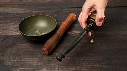 Religious Items Arranged on Wood Surface