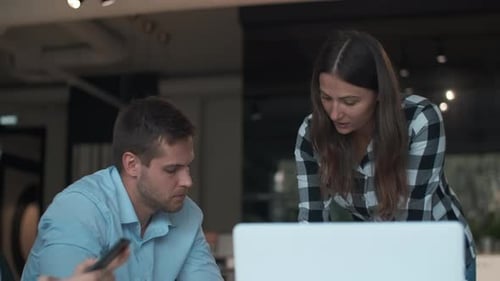 Teamwork at Office Table Discussing Project