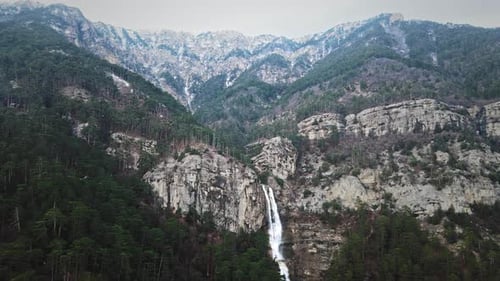 Beautiful Waterfall in Green Forest Aerial View