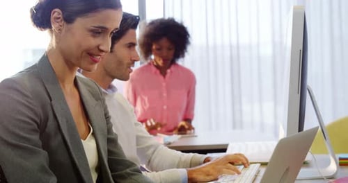 Business Team Collaborating in Modern Office Environment