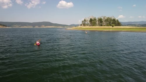 Aerial View of Kayak on the Lake in Mountains