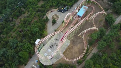 Roller Coaster Ride Through Green Forest Aerial View