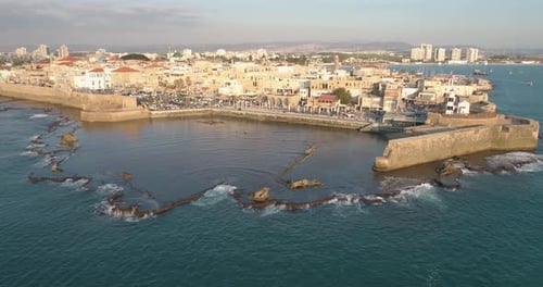 Aerial view of natural water pool along the coast in Acre Old town, Israel.
