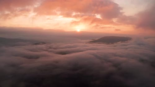 Aerial View of Foggy Sunrise in the Mountains